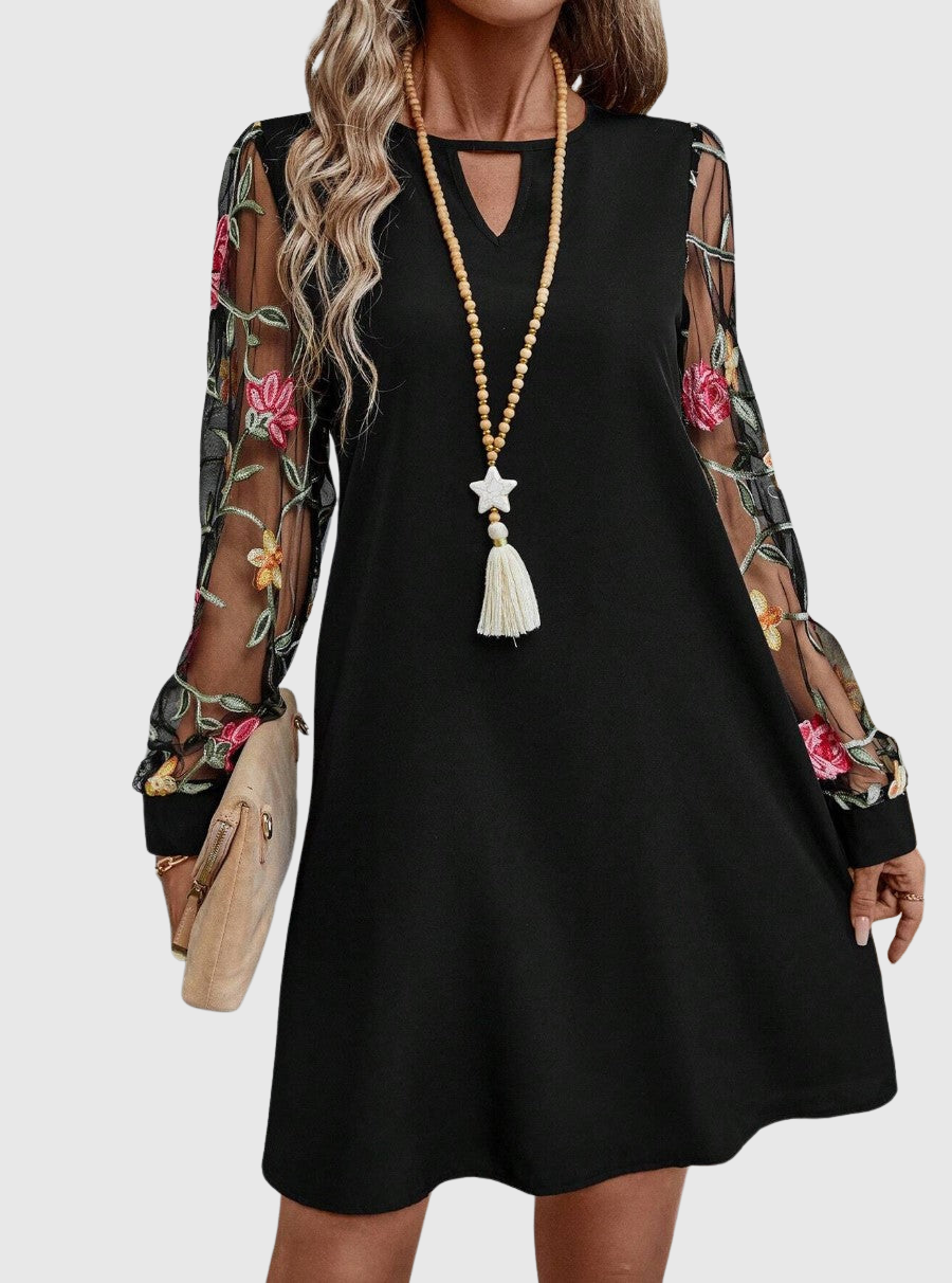 Jolanta | Elegantní šaty s výstřihem do a výraznými rukávy 