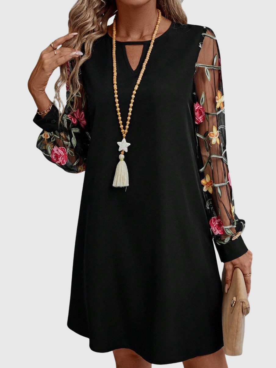 Jolanta | Elegantní šaty s výstřihem do a výraznými rukávy 