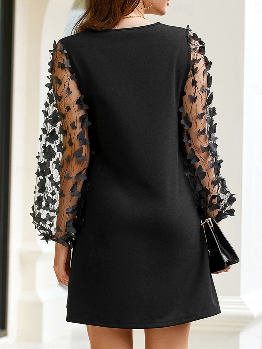 V něm | Černé elegantní šaty s květinovými rukávy z tylu 